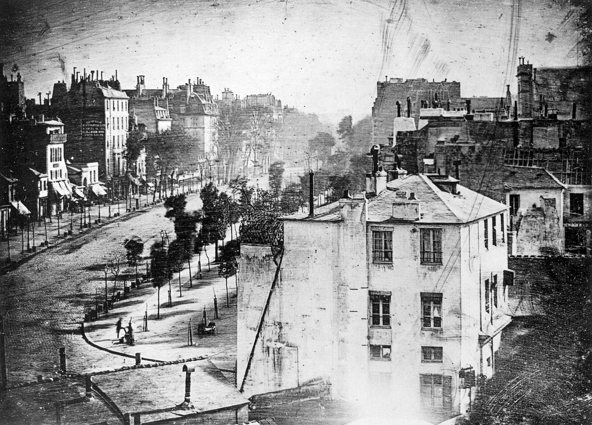 Louis Daguerre's Boulevard du Temple photograph showing a small human figure on a Paris street.