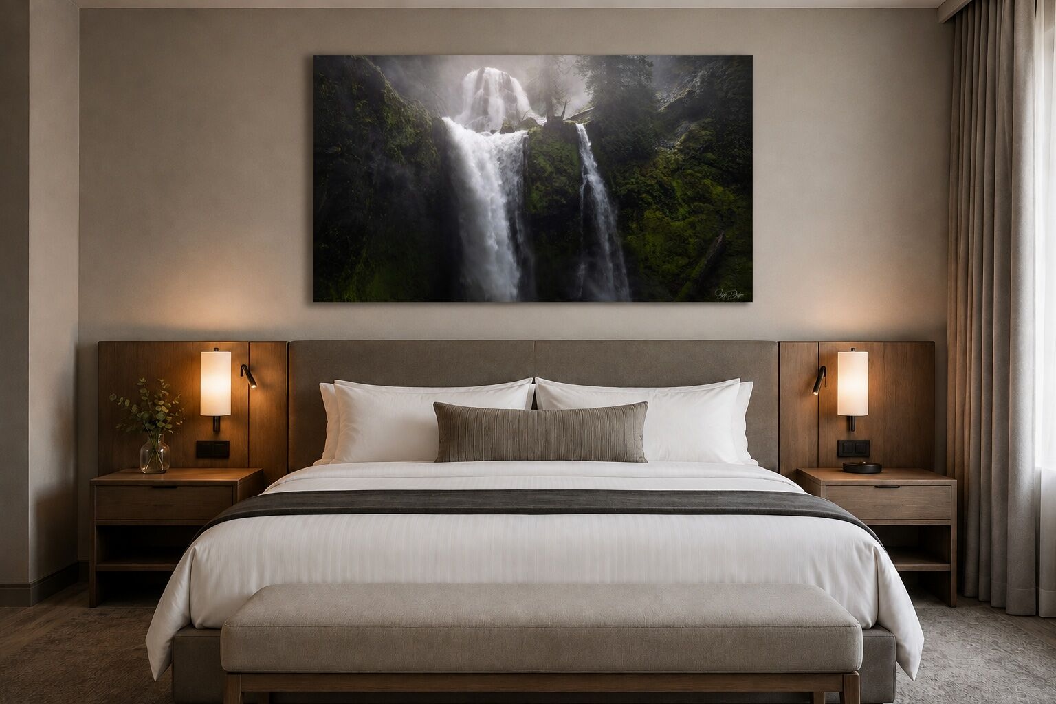 Columbia River Gorge waterfall photograph displayed as a frameless ChromaLuxe metal print above the bed in an upscale hotel guest room.