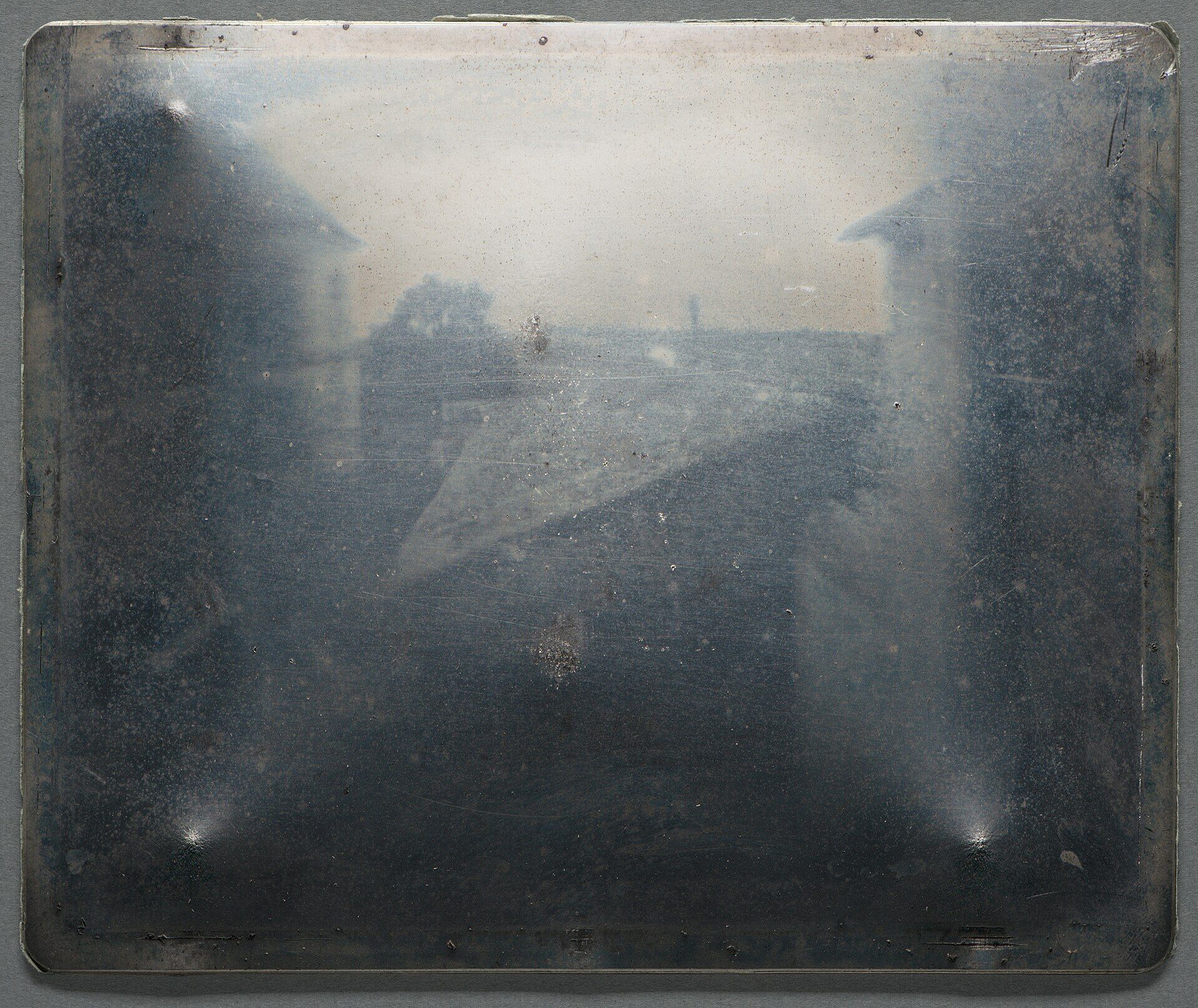 View from the Window at Le Gras by Nicéphore Niépce, the oldest known surviving photograph made with a camera.